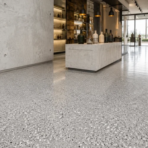 Decorative epoxy flake showroom floor in a modern Saudi commercial interior