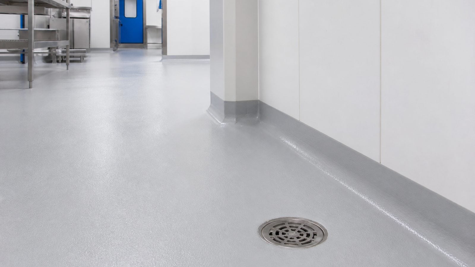 Hygienic epoxy flooring applications with coved skirting and drainage in Saudi Arabia
