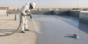 Polyurea spray coating on a Saudi roof deck for seamless waterproofing