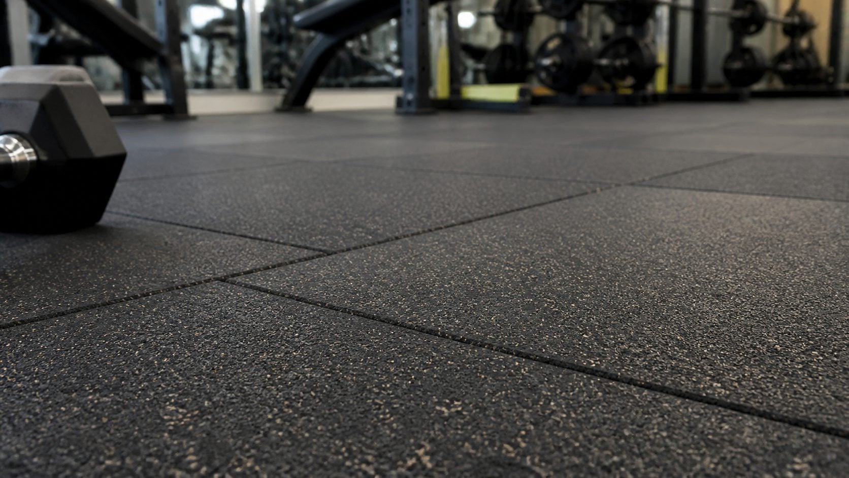 Rubber gym flooring tiles in a free weight fitness area in Saudi Arabia