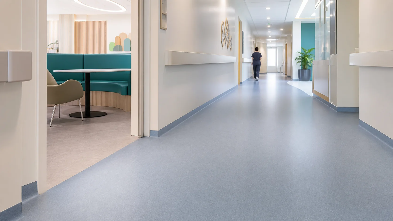 Hygienic vinyl flooring in a modern healthcare corridor in Saudi Arabia
